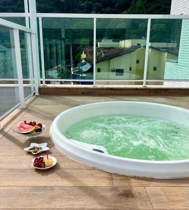 Cobertura Santorini Nova com Spa e Solário na Praia Grande