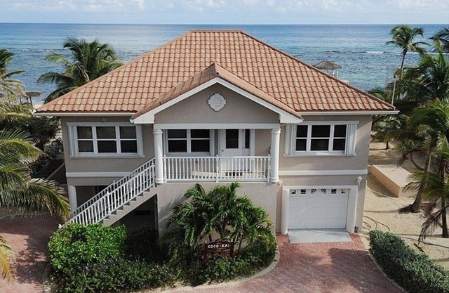 Coco Kai Beach Front Villa with Heated Pool and Private Dock