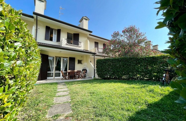Colorful house with pool and garden