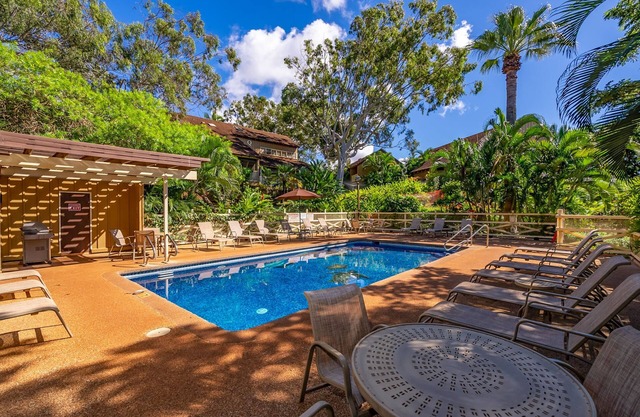 Colorful condo by the beach with a washer/dryer, lanai, & on-site pool