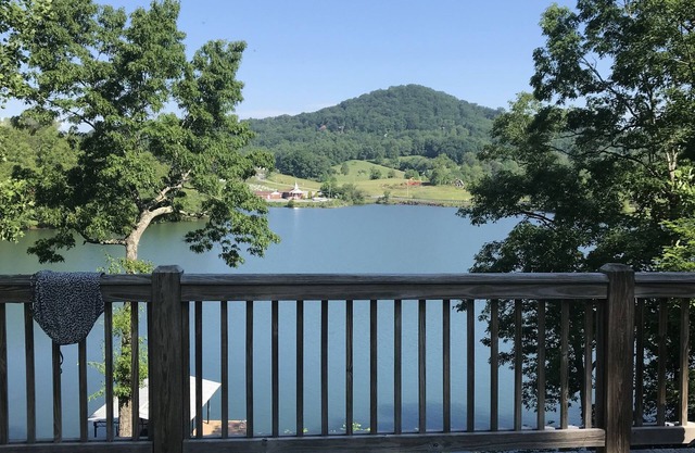 Colorful lakeside home with beautiful views and dock access