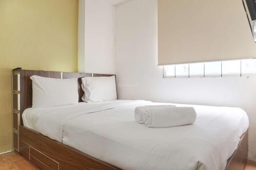 Combined and Spacious 3BR at Green Pramuka City Apartment By Travelio