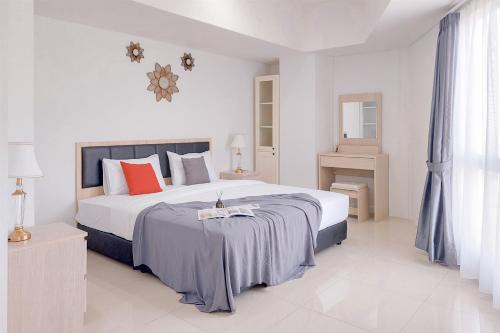 Comfortable and Homey 1BR Tamansari Bintaro Mansion Apartment By Travelio