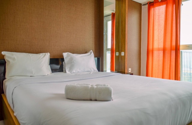 Compact and Modern Studio Room at Casa De Parco Apartment