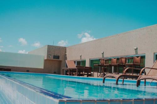 Confortável Flat com vista parcial do mar de Intermares