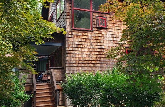 Contemporary Farmhouse, 4200 sq ft on 9 acres with private neighborhood beach.