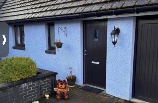 Cosy cottage in a lovely setting of Tomintoul with panoramic views of the hills