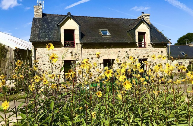 cottage in the countryside with its view of the black mountains