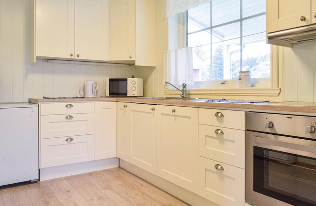 Cottage on farm in rural environment.