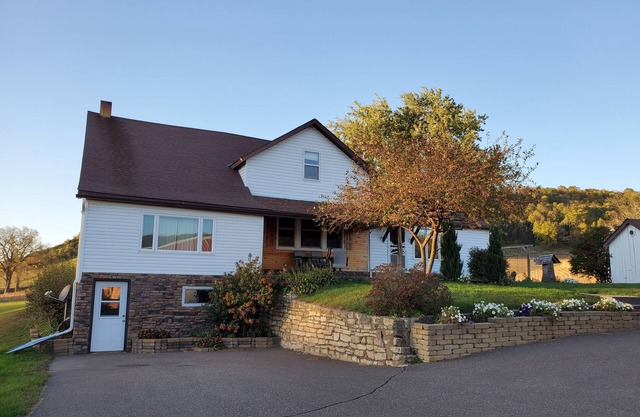 Country farm house located on 60 acres in peaceful valley by Fountain City WI