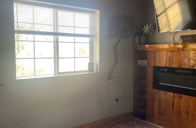 Country living in this cute one-bedroom renovated farmhouse from 1898.