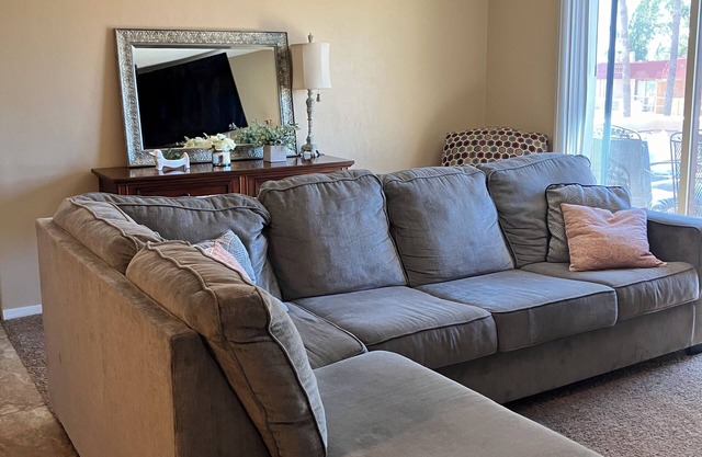 Cozy 2-bedroom condo with WiFi, AC, and a community pool in serene Tucson.