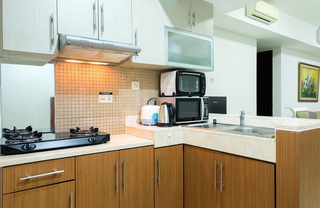 Cozy and Elegant 2BR Kemang Village Apartment