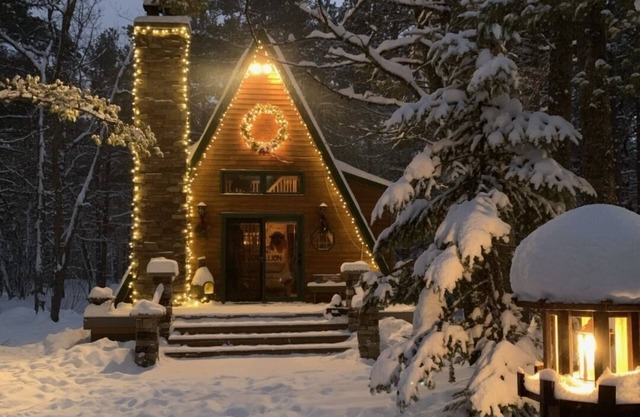 Cozy Cabin nestled in the woods on all season road seconds from the trail system