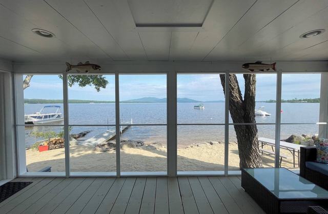 Cozy lakefront home on Ossipee Lake, w/beach, dock and amazing view.
