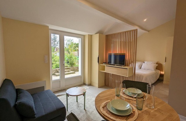 Cozy Studio with Private Terrace in St Cybard, Near Bus Lines and Outdoor Activities