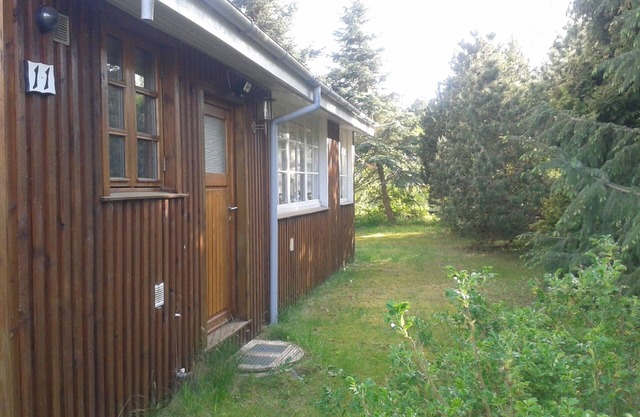 Cozy wooden house 300 m from the water. Close to Lalandia and Knuthenborg Wildlife Park