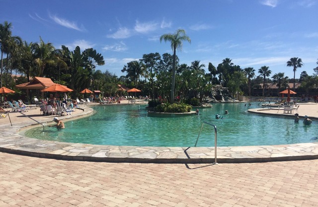 DECEMBER/CHRISTMAS SPECIAL. PEACEFUL LAKE VIEW FROM CONDO Resort style pool