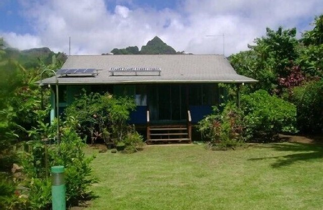 Detached house in a tropical garden with relaxing sea view