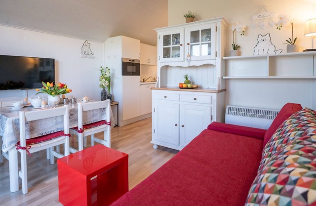 Dina with parking and shared pool by Interhome