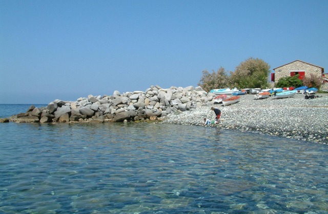 Directly on the shore independent stone house