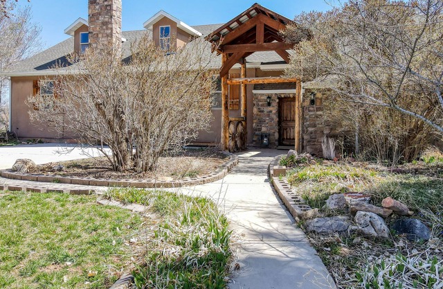 Dog-friendly home with deck, fireplace & wood stove, pool table, & washer/dryer