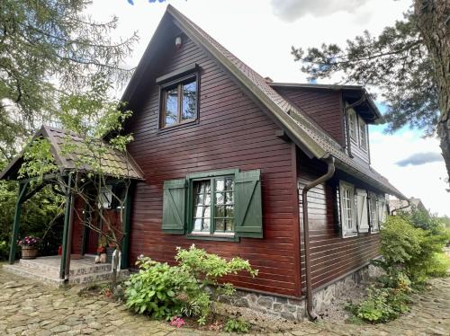 Dom Zielarki z widokiem na jezioro, sauna, balia