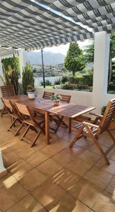 Duplex en urbanización con piscina comunitaria y wifi