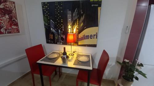 El estudio de las mariposas,sofa cama , cocina y baño