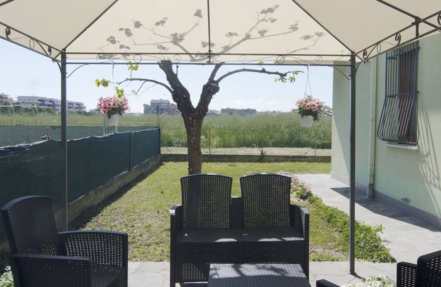 Elegant and spacious apartment with private garden near the sea.