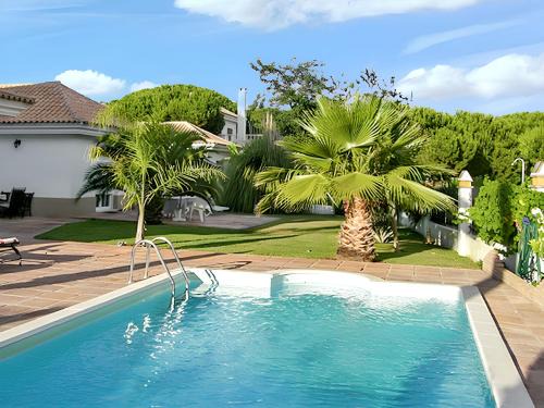 Elegant Villa in Nuevo Portil with Shared Pool