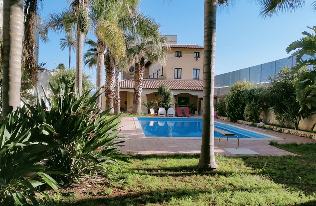 Elegant villa with garden and private pool.