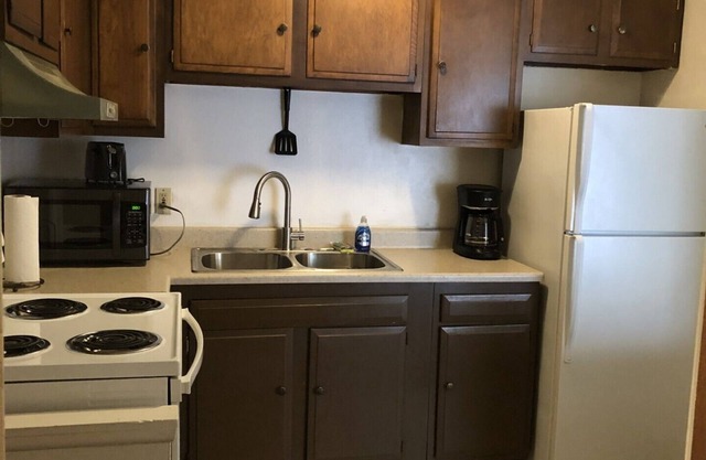 English Tudor Apartment with Assigned Covered Parking