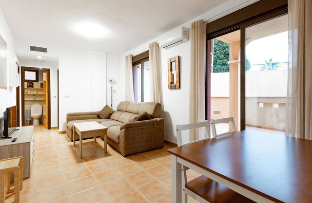 Enjoy a relaxing vacation in this terraced house with communal pool.