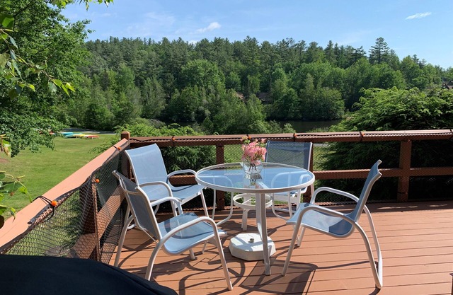 Enjoy beautiful water views from this light-filled condo with three levels of furnished living space