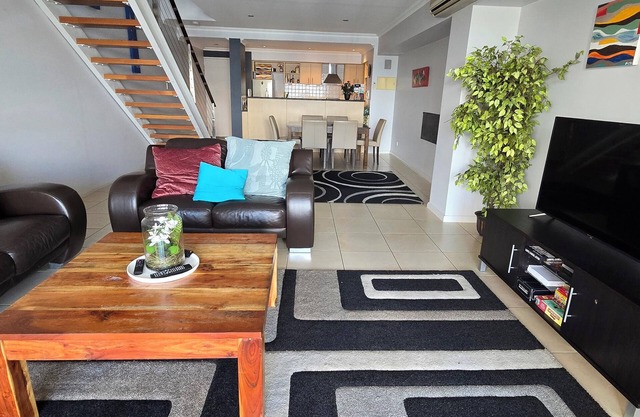 Enjoy Water Views in a Stylish 2BR/2BA Apartment, Steps from Beach & Dining