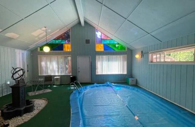 Enjoy your own Indoor Pool in this upscale home on a golf course!