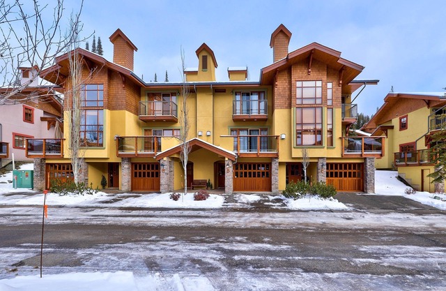 Exceptional multi level 2 bedroom +den townhouse with easy access to nearby runs and lift