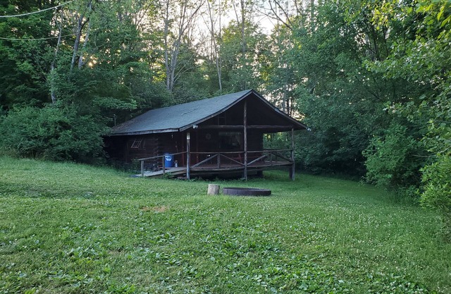 Exclusive Single Log Cabin By a fully stocked Lake