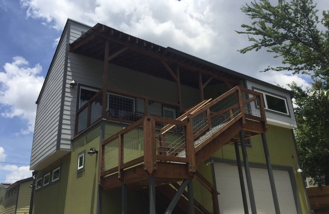 Explore UT, Moody Center, downtown, restaurants, bars from relaxing upper flat