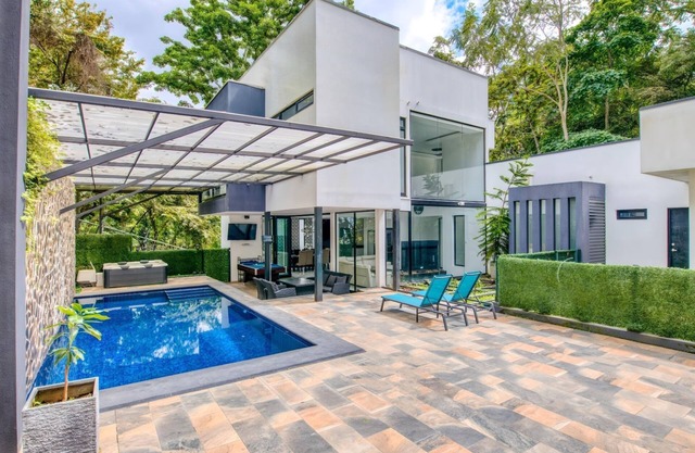 Exquisite 7-Bedroom Mansion in Escazú featuring Heated Pool, Jacuzzi, & Full AC.