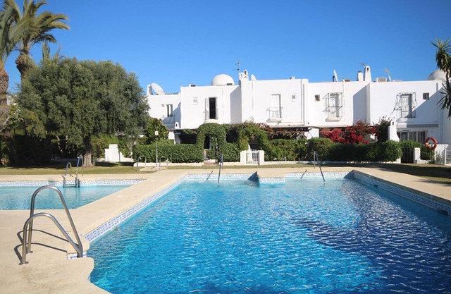 Fantastic townhouse for holiday lets in complex with swimming pool