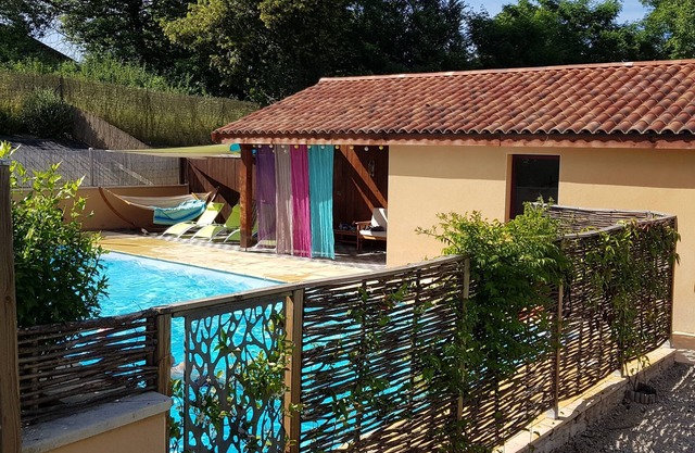 Family friendly Gite with large heated pool (Salt) and garden with games area