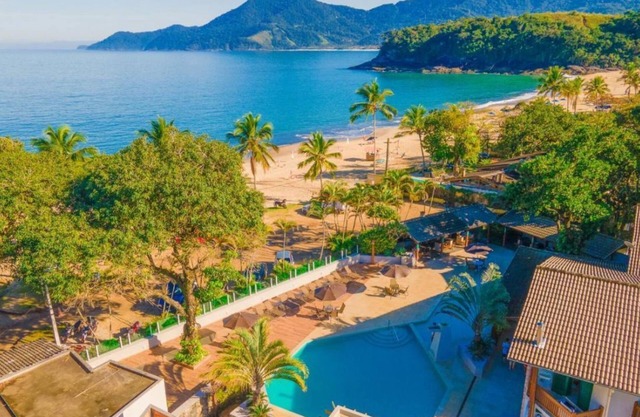 Flat Praia de Pauba, right on the sand, heated pool, barbecue and sauna.