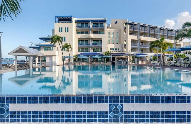 Flamingo Beach by Hilton: Oceanfront Resort, Pools & Spacious Studios To Relax!