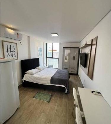 Flat com piscina a 200m da praia