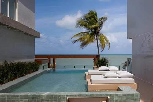 Flat pé na areia c/vista 406B Branco Haus -MyFlats