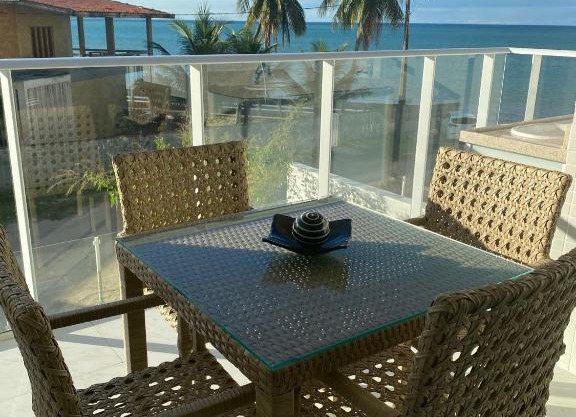 Flat pé na areia do Caribessa