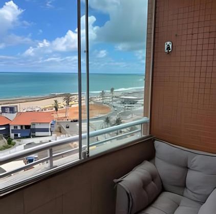 Flat praia a beira-mar