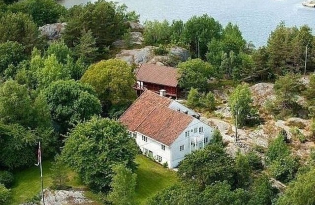 Flott Hus ved sjøen Brygge Båt Nært Kristiansand Aagerøya